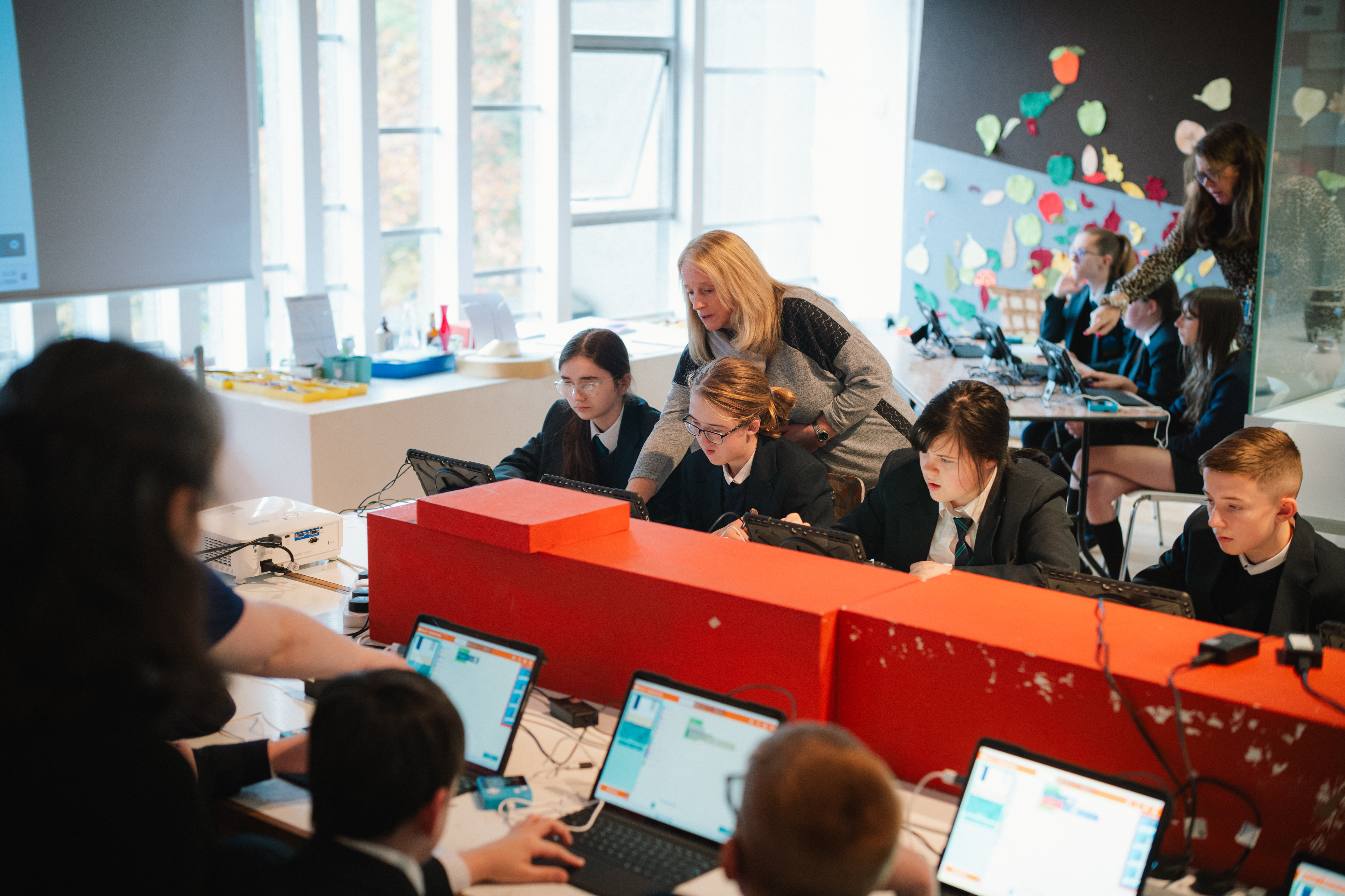 Students taking part in a STEAM Studio coding activity.