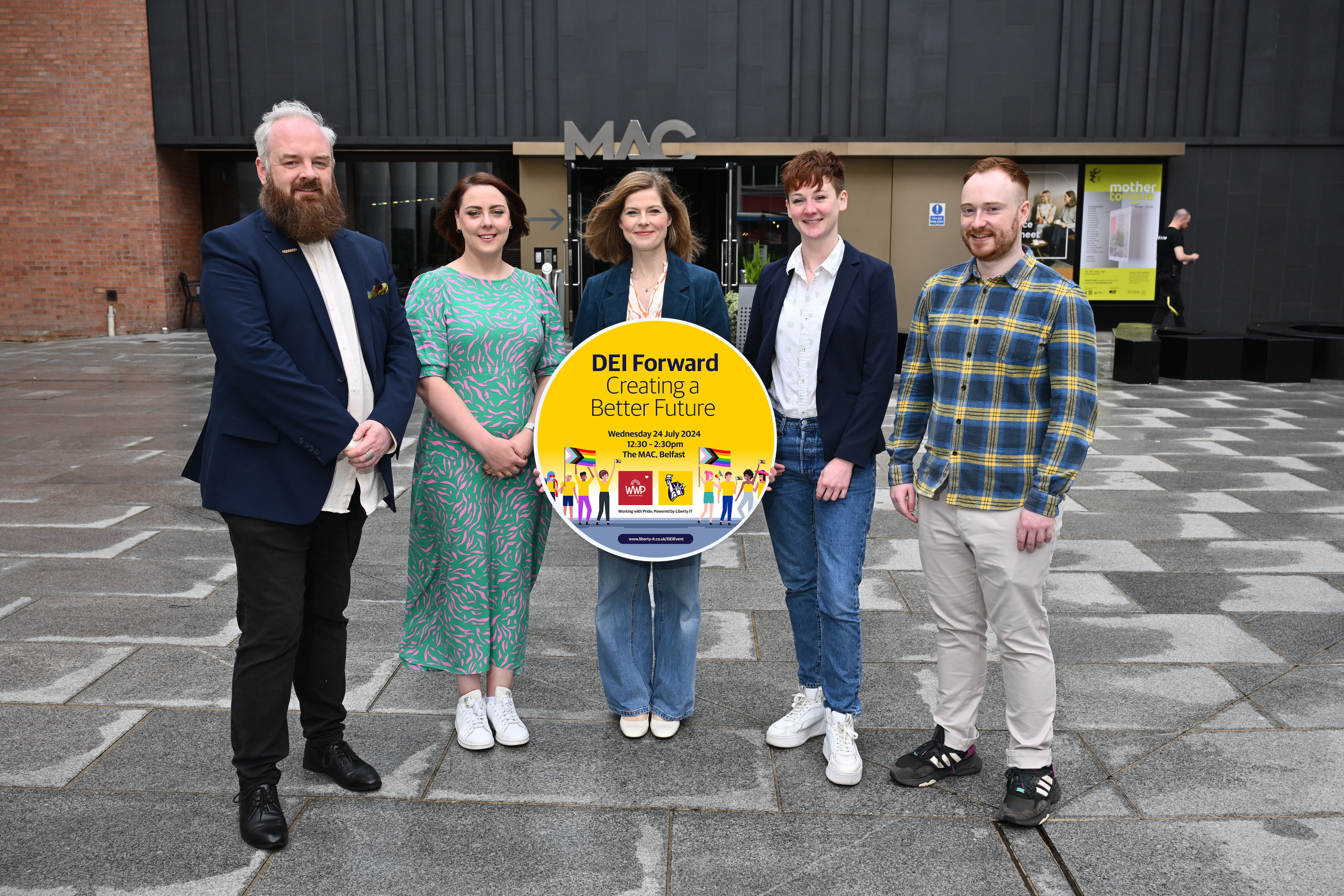 Photo of five people holding a DEI Foward logo